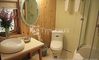 Zhongyi Inn Lijiang Xiangshuyuan Courtyard Hotel 2*